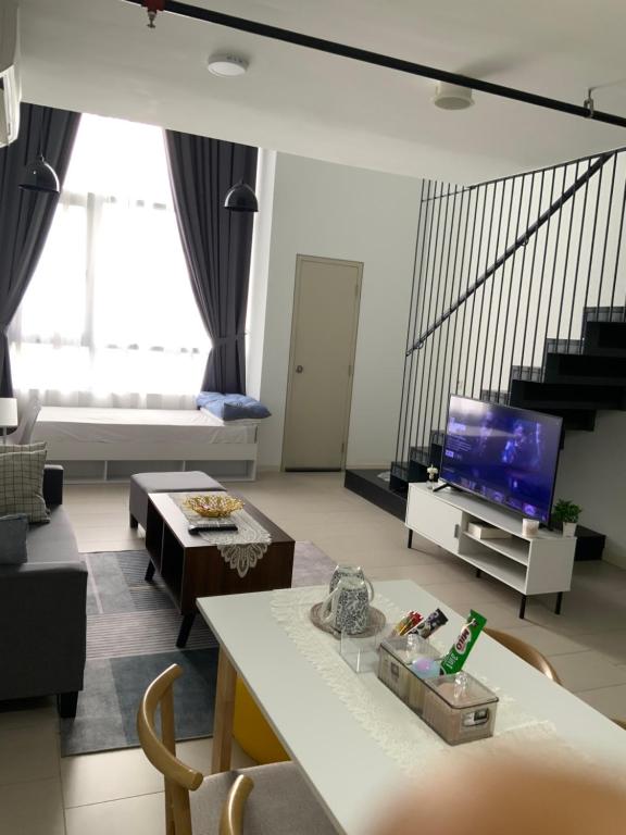 Posezení v ubytování B & B Cozy Duplex Tamarind Square Cyberjaya