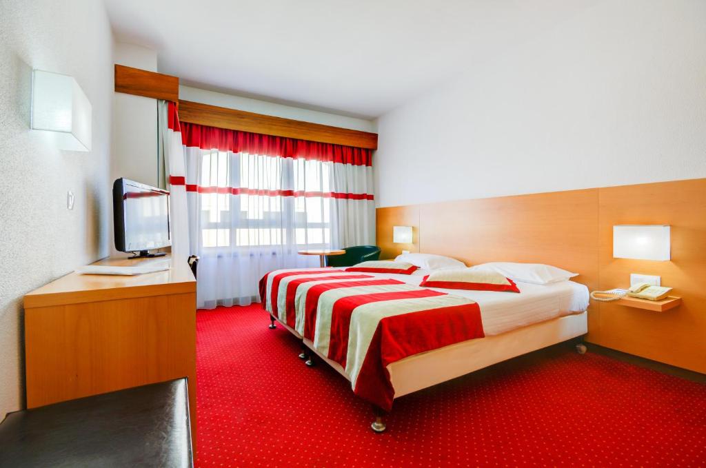 
Cama o camas de una habitación en Belver Beta Porto Hotel
