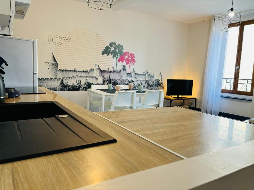 Photo de la galerie de l'établissement Spacieux, Climatisé, Quartier Calme, Proche Château, Le Cocon De Joy, à Carcassonne