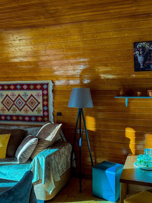 Postel nebo postele na pokoji v ubytování Donata Cottages kazbegi