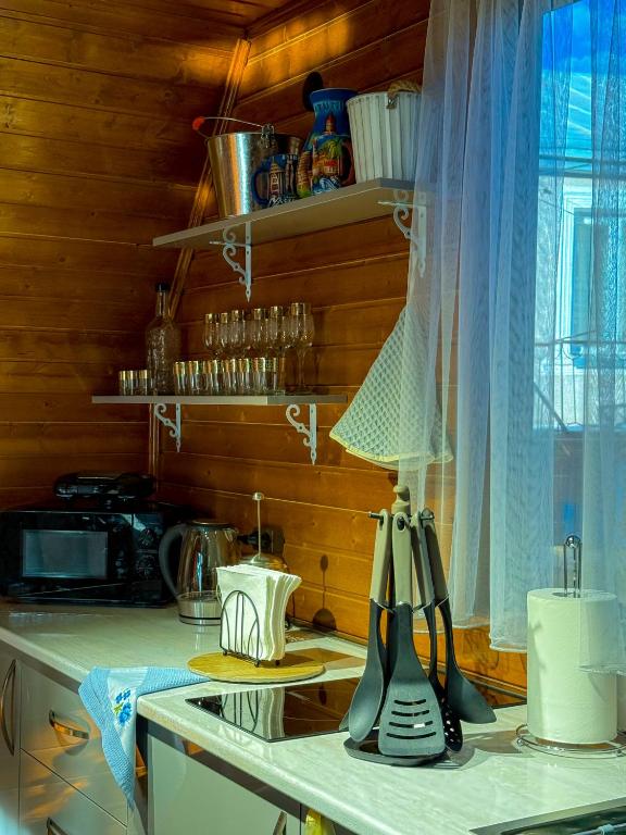 Kuchyň nebo kuchyňský kout v ubytování Donata Cottages kazbegi
