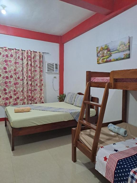 Postel nebo postele na pokoji v ubytování Friendly Transient House