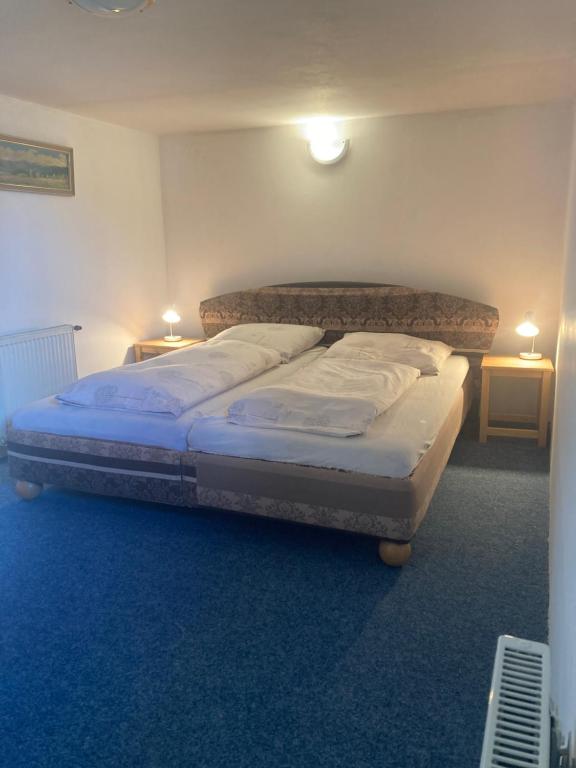 Postel nebo postele na pokoji v ubytování Apartmán u Bětky