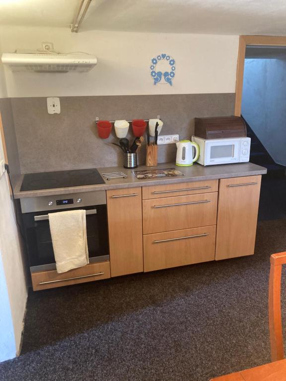 Kuchyň nebo kuchyňský kout v ubytování Apartmán u Bětky