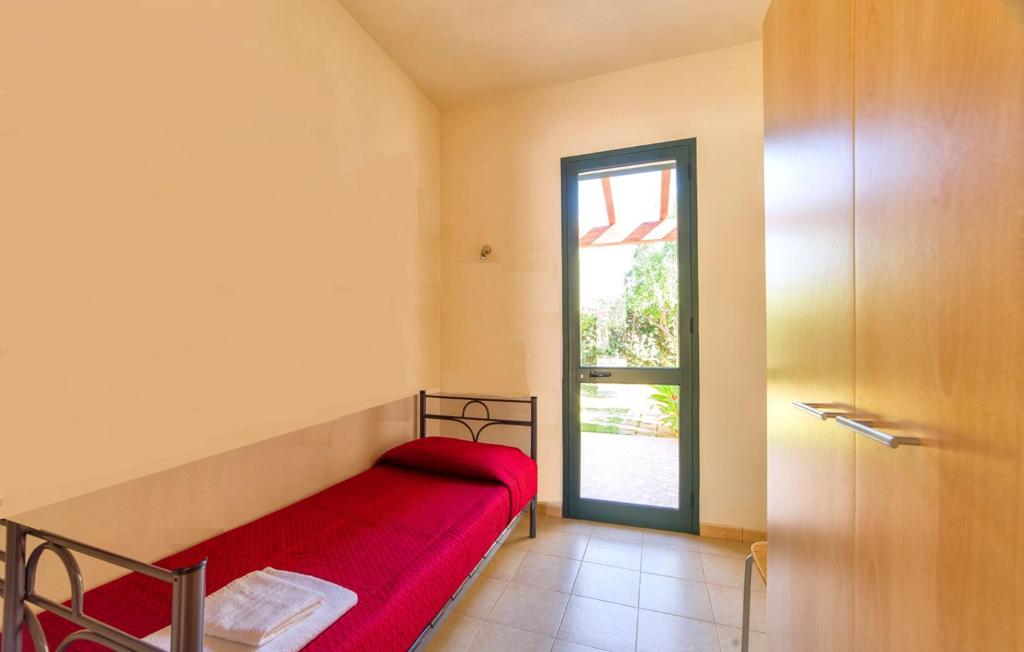 Postel nebo postele na pokoji v ubytování Lilybeo Village