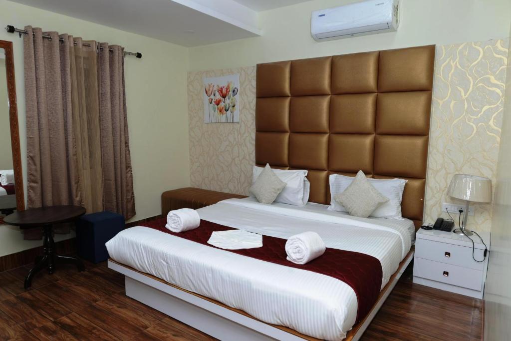 Ліжко або ліжка в номері Hotel Priority A Unit of Priority Hospitality