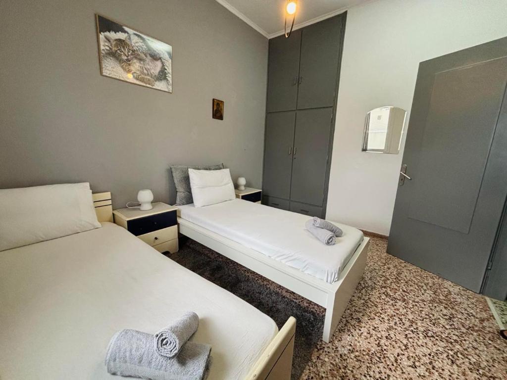 Posteľ alebo postele v izbe v ubytovaní ERIS House