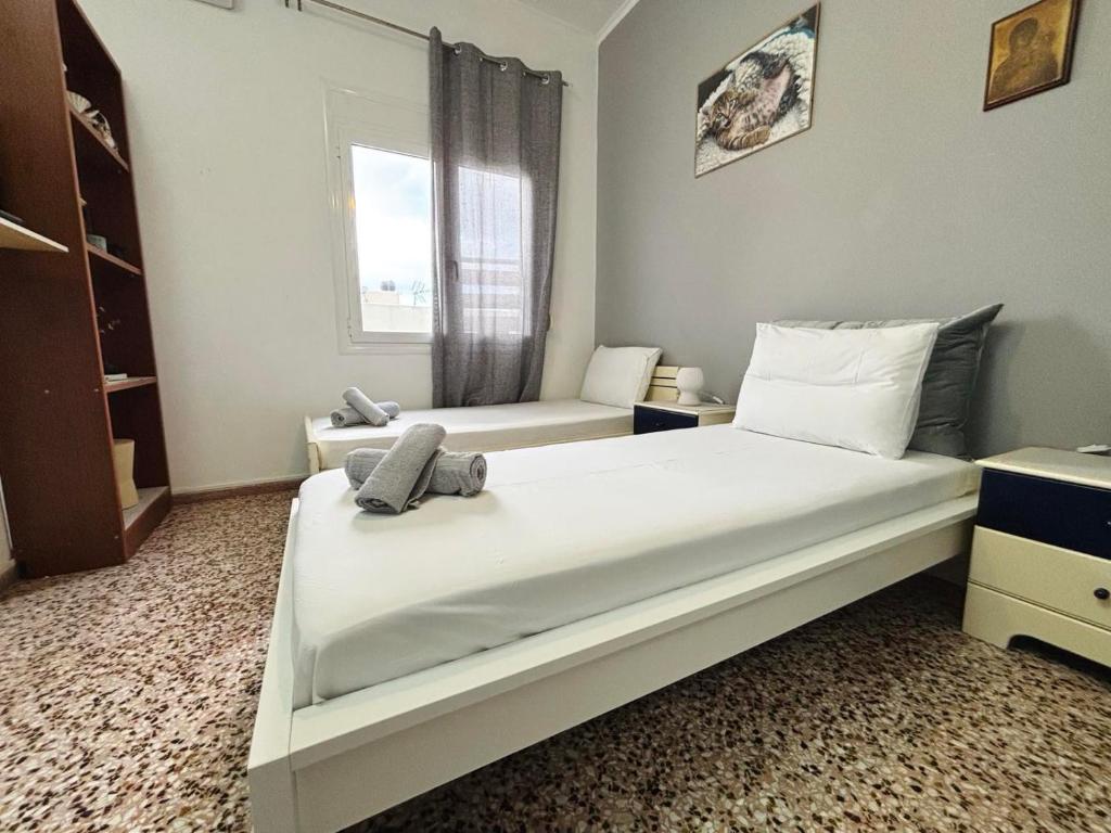 Posteľ alebo postele v izbe v ubytovaní ERIS House