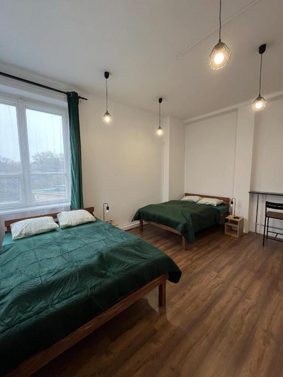Postel nebo postele na pokoji v ubytování W94 Hostel