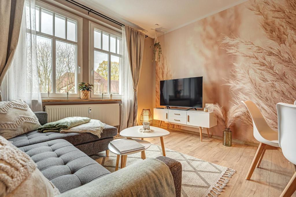 TV a/nebo společenská místnost v ubytování Ferienwohnung Ferdinand