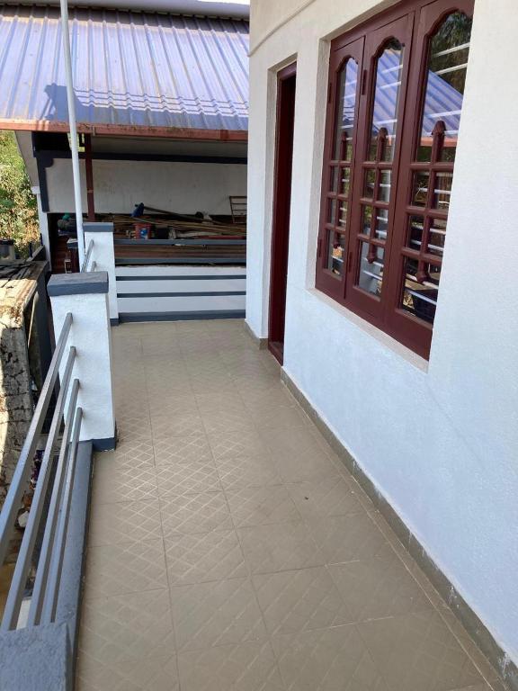 Balkón nebo terasa v ubytování AKSHAYA 3 BHK Villa