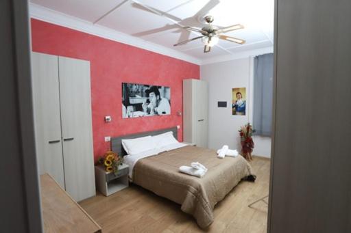 Postel nebo postele na pokoji v ubytování B&B Central Palace King Of Rome