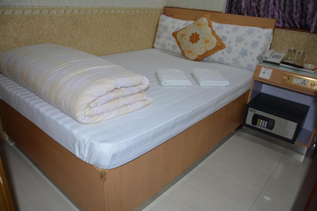 Postel nebo postele na pokoji v ubytování Everest Guest House