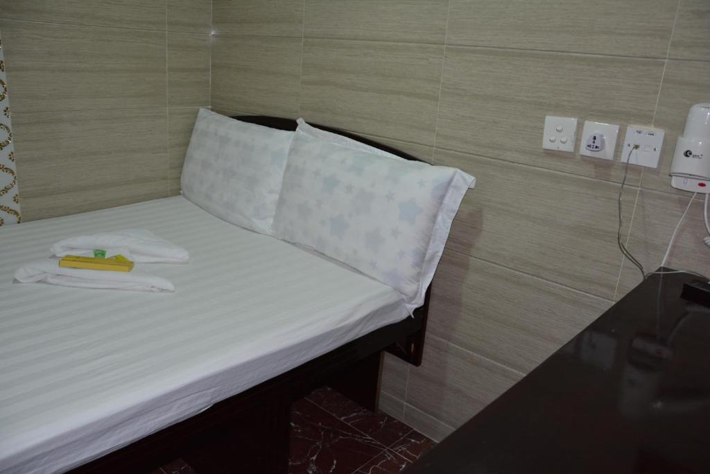 Postel nebo postele na pokoji v ubytování Everest Guest House