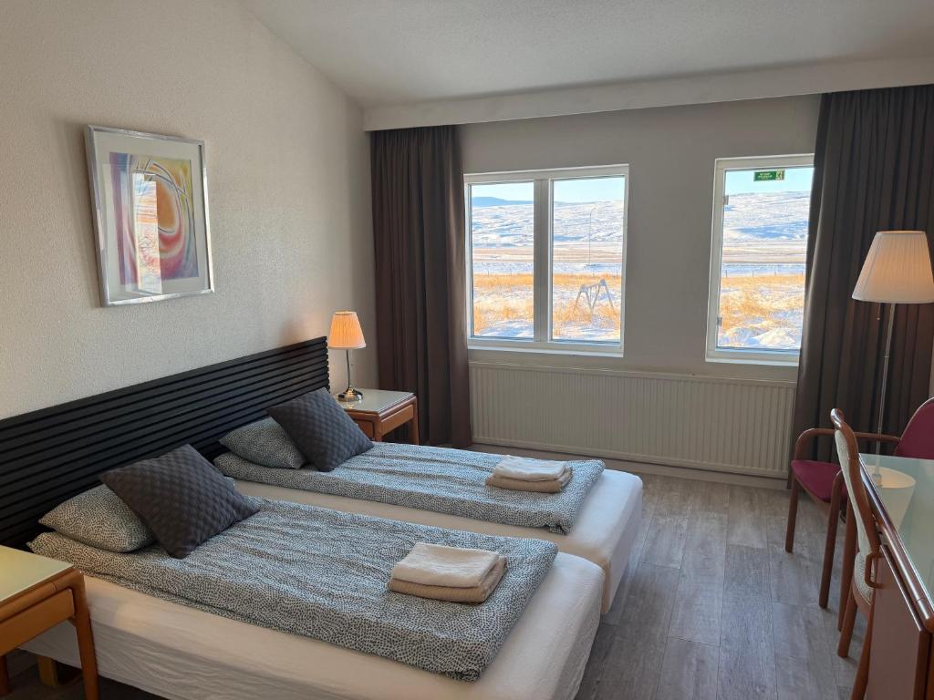 Postel nebo postele na pokoji v ubytování Frost Guesthouse