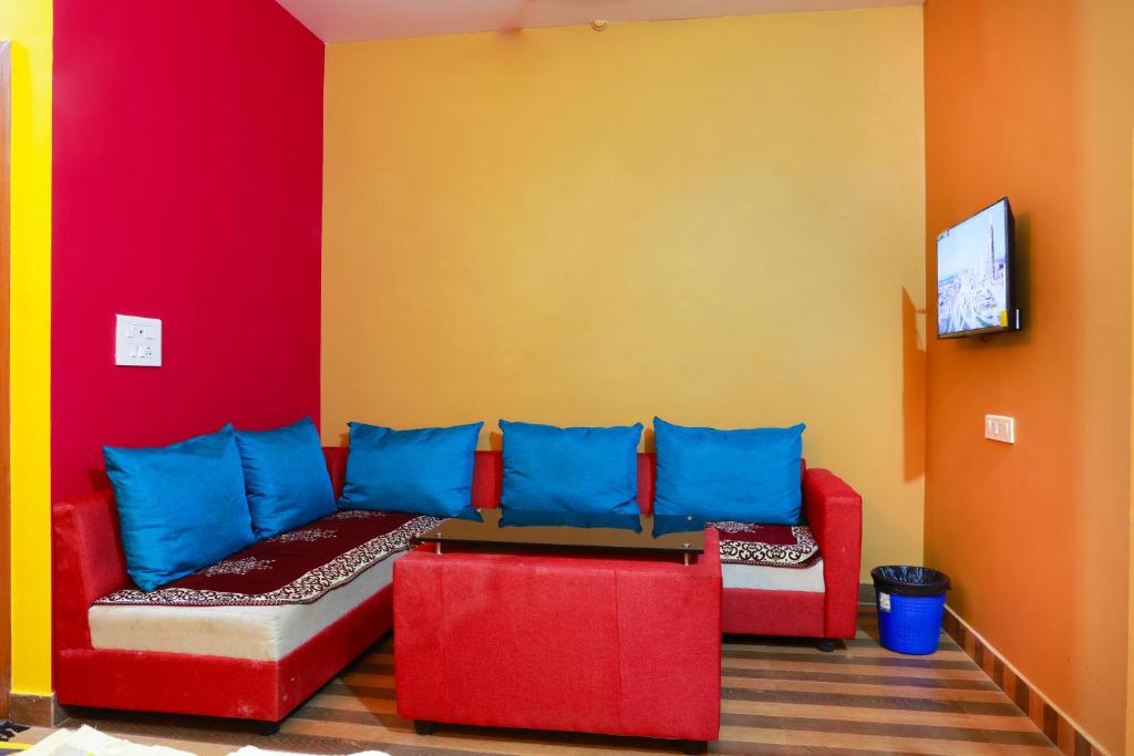 Posezení v ubytování Chithralaya Guest House