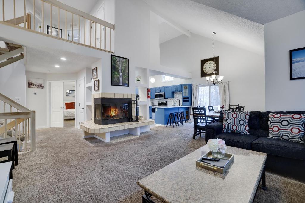 a living room with a couch and a fireplace at Lake Harmony Retreat Perfect Family Getaway in Lake Harmony