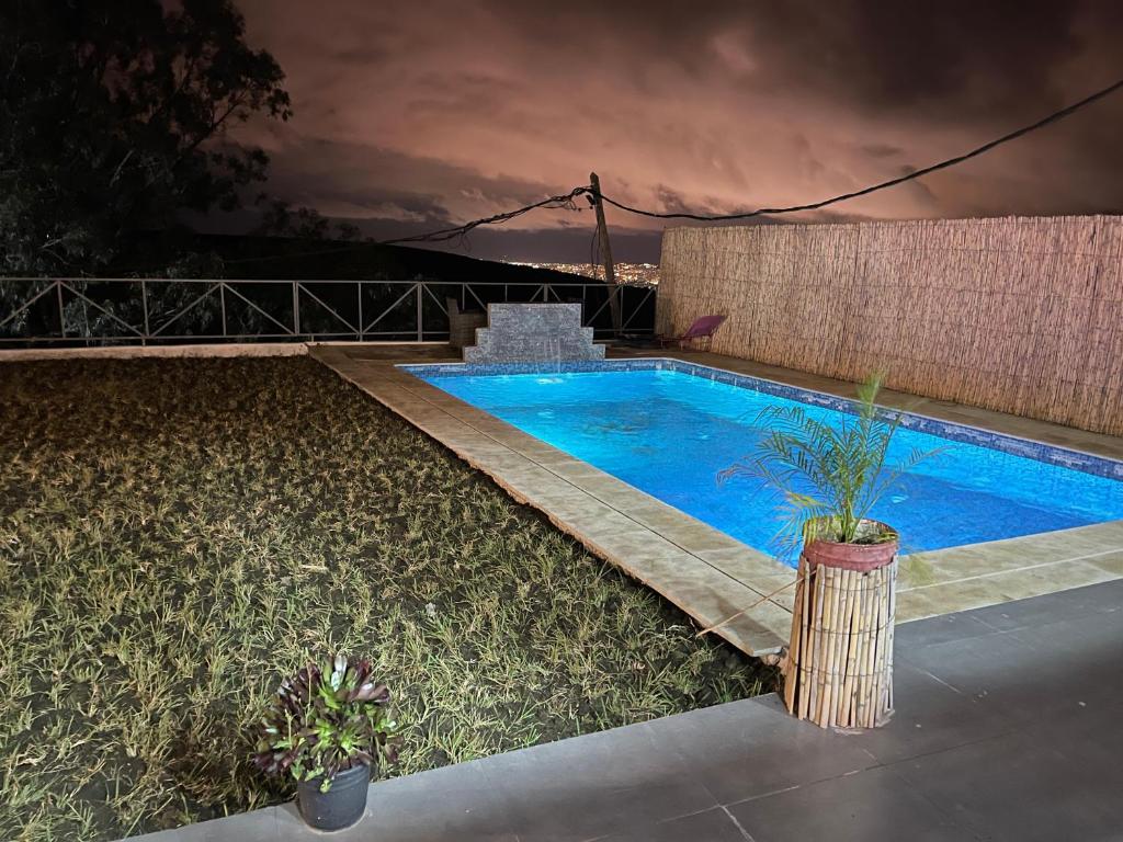 a small swimming pool in a yard with at villa ain zaytouna tanger in Tangier