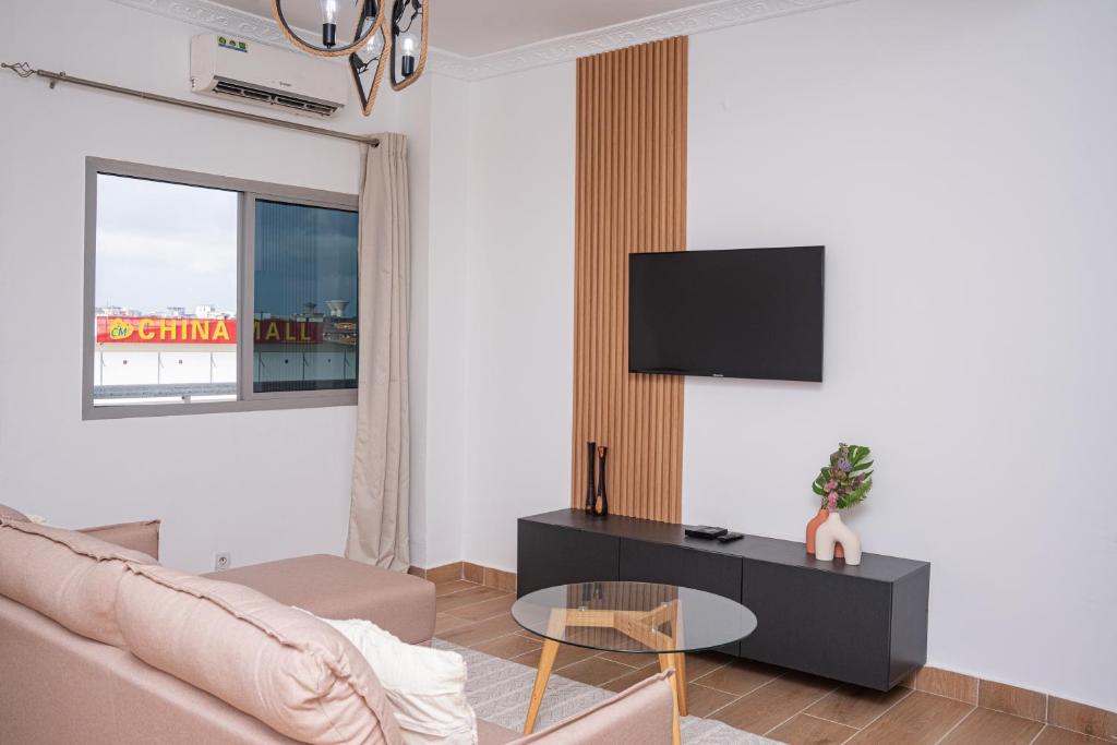 Телевизор и/или развлекательный центр в Charmant et cosy T3 à Cocody proche centre ville