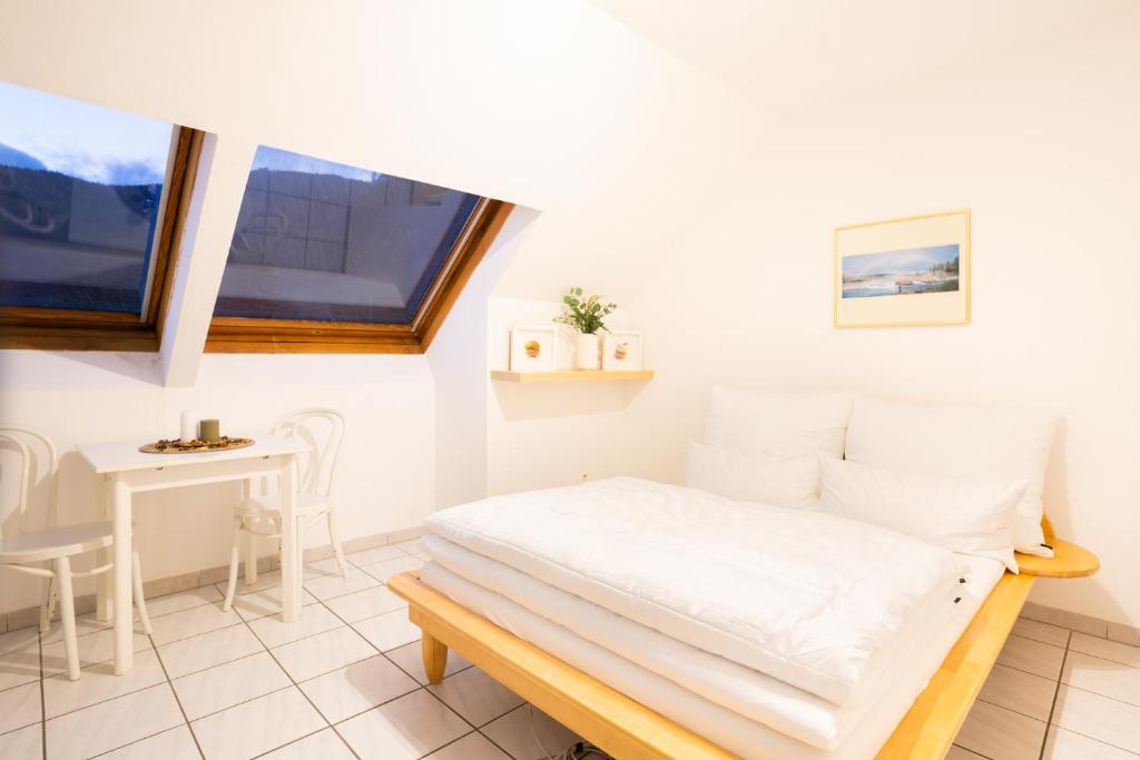 Postel nebo postele na pokoji v ubytování Hirschenhof Apartments