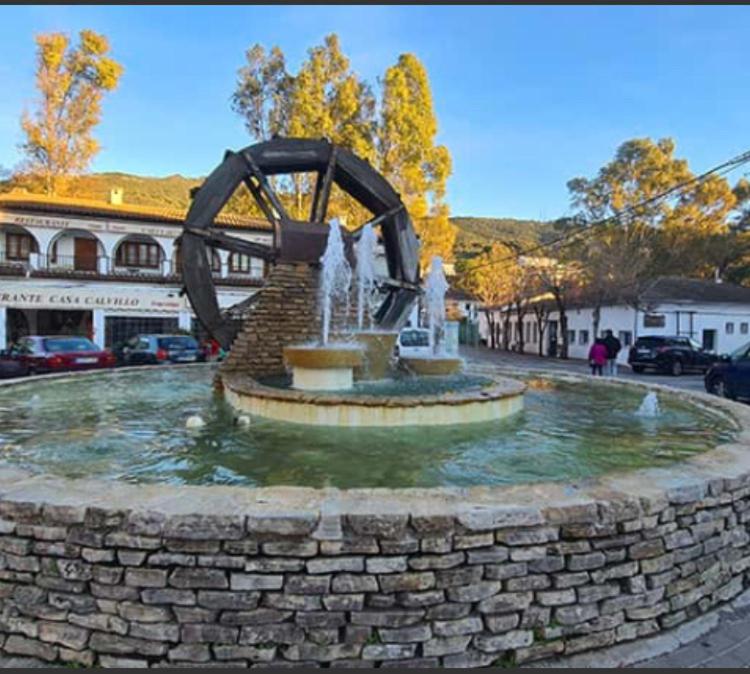 a fountain in the middle of a street at Casa Celia in El Bosque