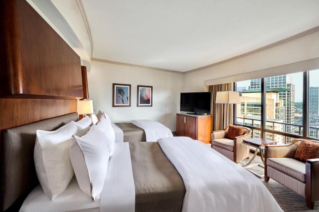 Postel nebo postele na pokoji v ubytování The Westin Seattle