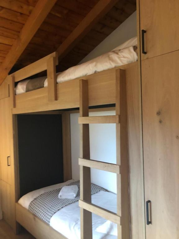 Postel nebo postele na pokoji v ubytování Le Chalet De Saint-Hubert