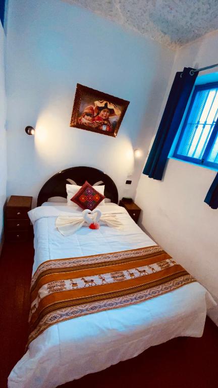 Postel nebo postele na pokoji v ubytování Amira's House Cusco