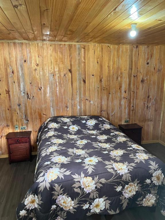 Cama o camas de una habitación en Cabañas Don Agustín Pucón