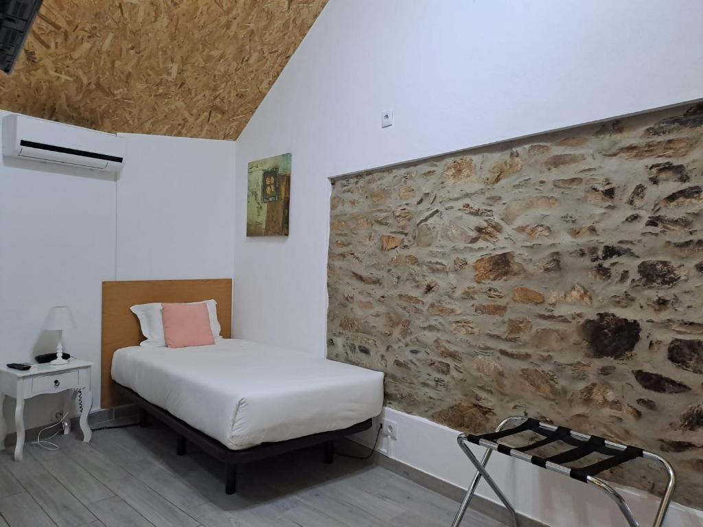 Postel nebo postele na pokoji v ubytování Largo da Fonte