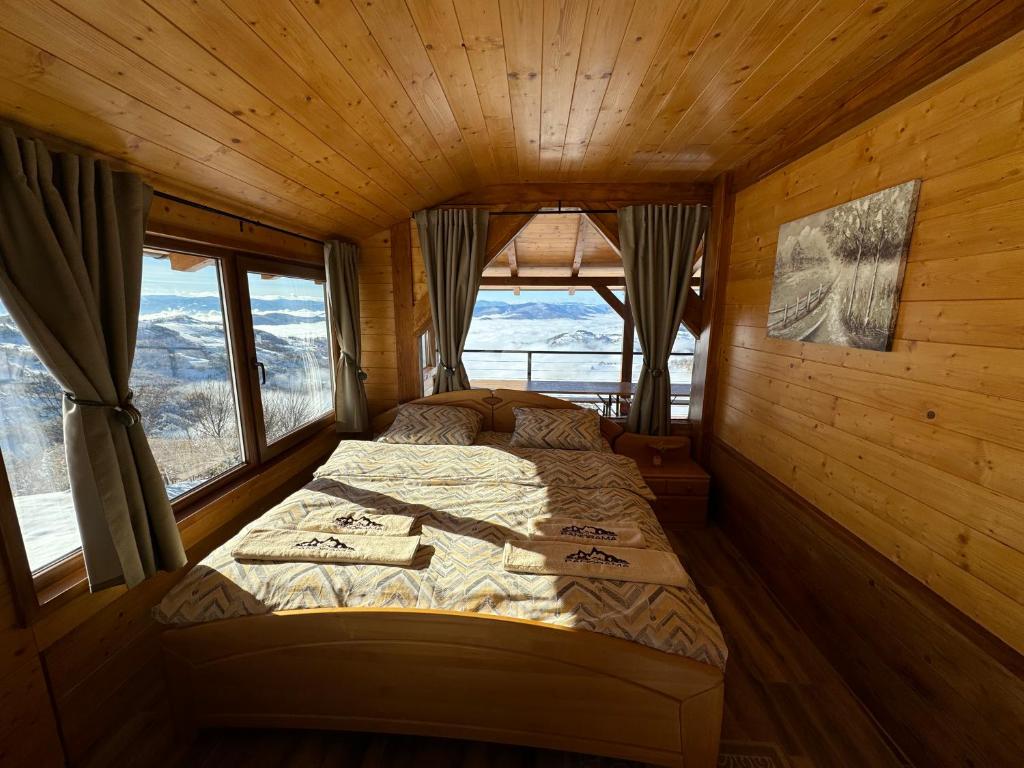 Postel nebo postele na pokoji v ubytování Vikend kuca Panorama