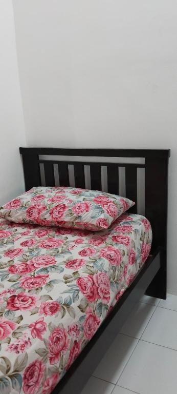 Postel nebo postele na pokoji v ubytování Nana Homestay