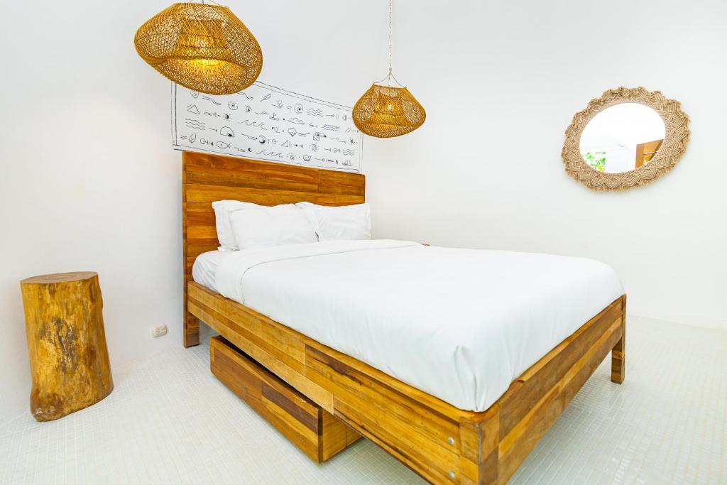 Postel nebo postele na pokoji v ubytování Igloo Beach Lodge