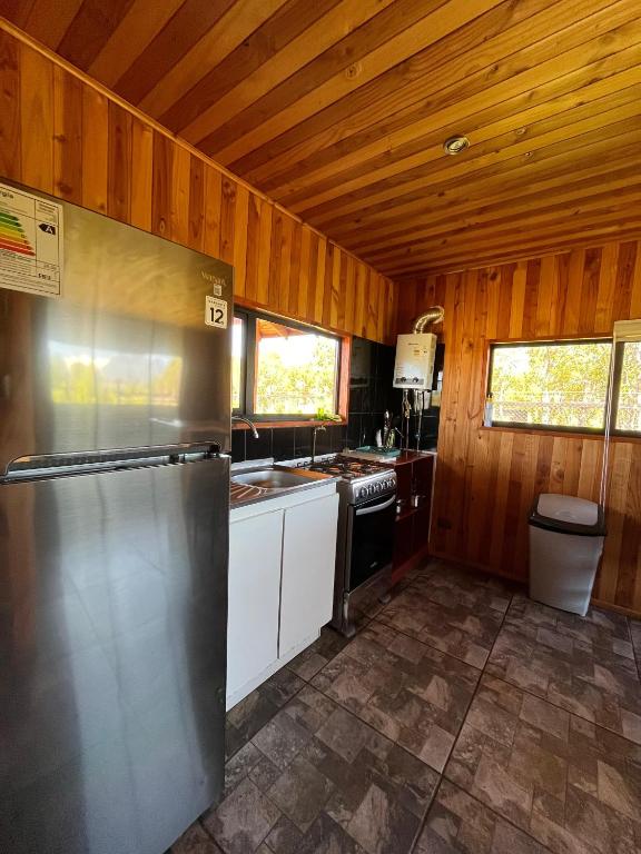 Una cocina o zona de cocina en Cabañas Don Agustín Pucón