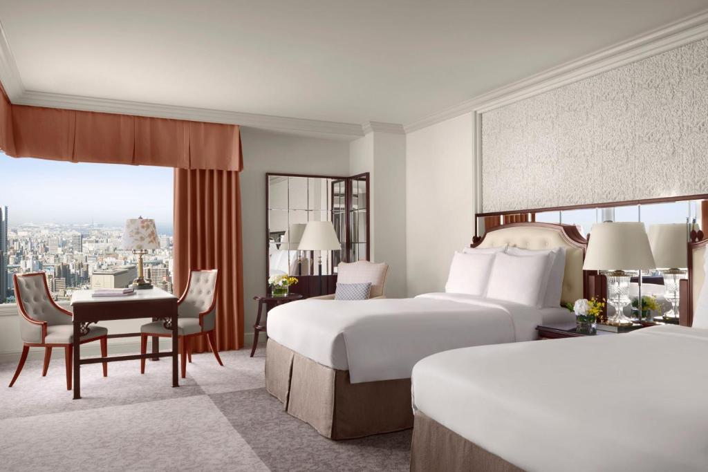 Postel nebo postele na pokoji v ubytování The Ritz-Carlton Osaka