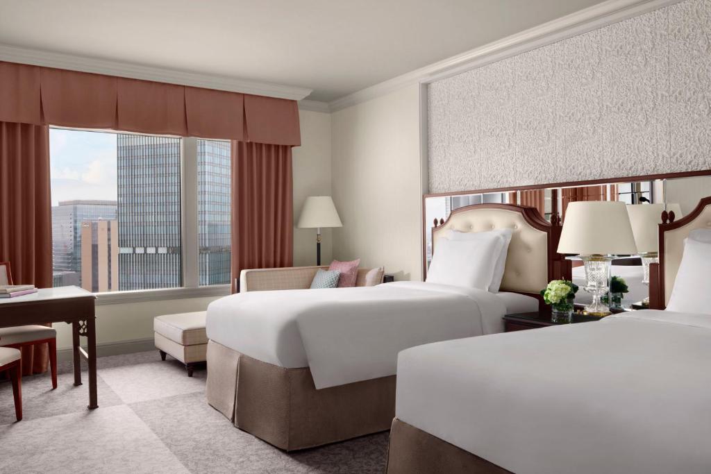 Postel nebo postele na pokoji v ubytování The Ritz-Carlton Osaka