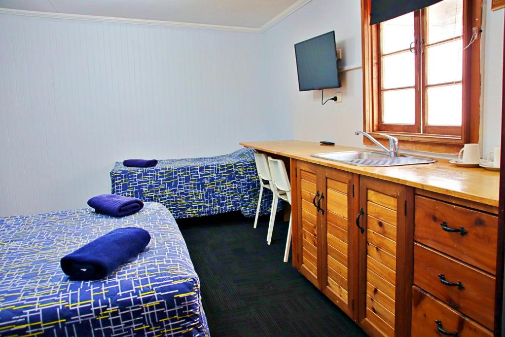 Brisbane Manor - Camera Tripla Con Bagno Privato