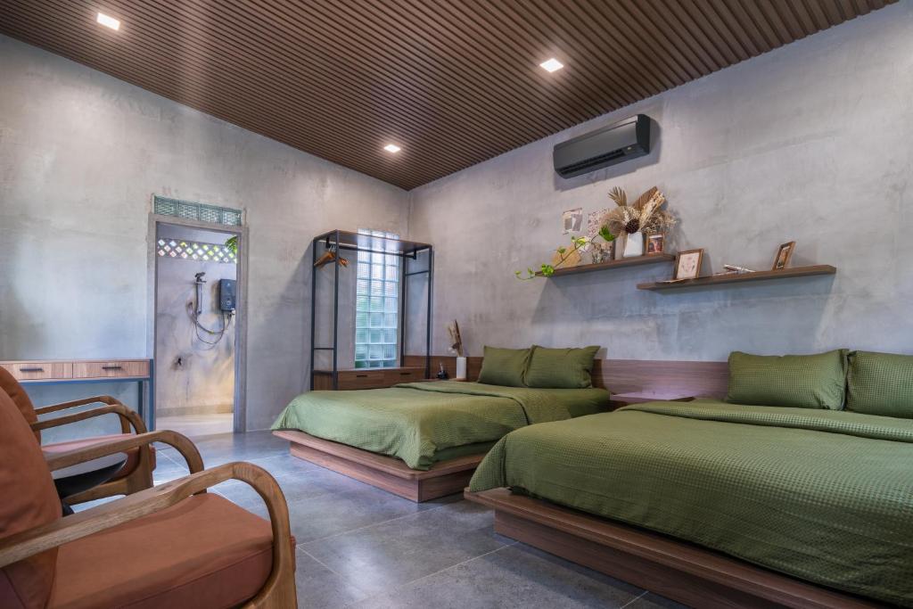 Khu vực ghế ngồi tại Eco House Villa