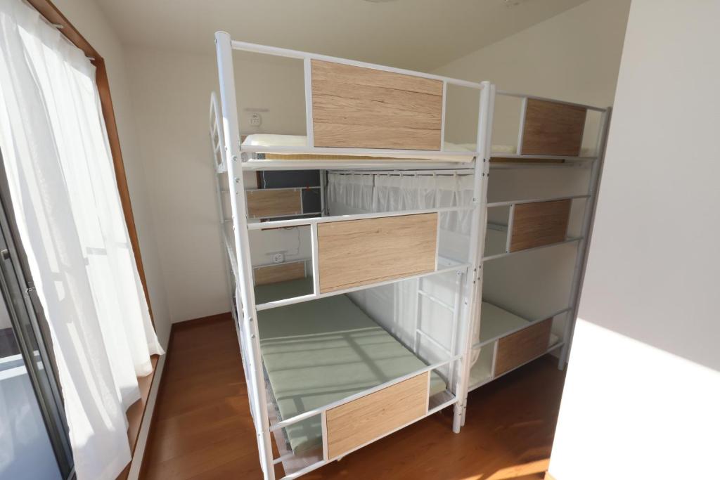 Palanda nebo palandy na pokoji v ubytování Mount Fuji Omotenashi Guesthouse
