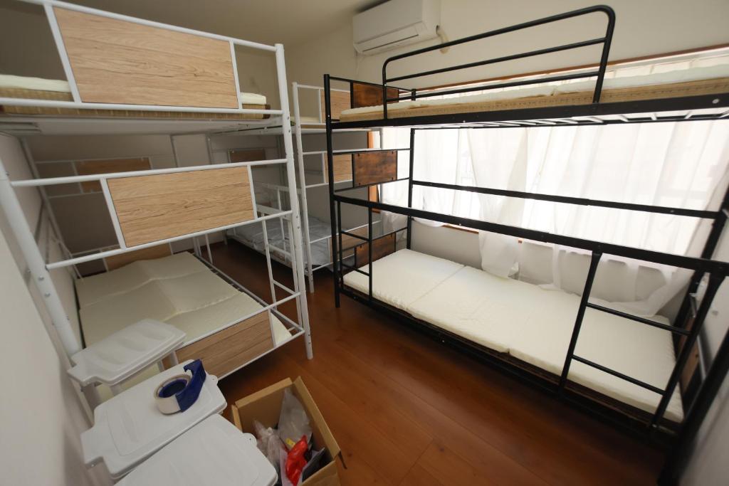 Palanda nebo palandy na pokoji v ubytování Mount Fuji Omotenashi Guesthouse