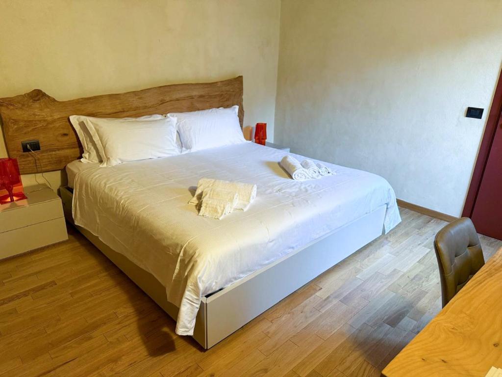 Postel nebo postele na pokoji v ubytování Il Carro Rooms - Monza Centro, Tribunale, Ospedale