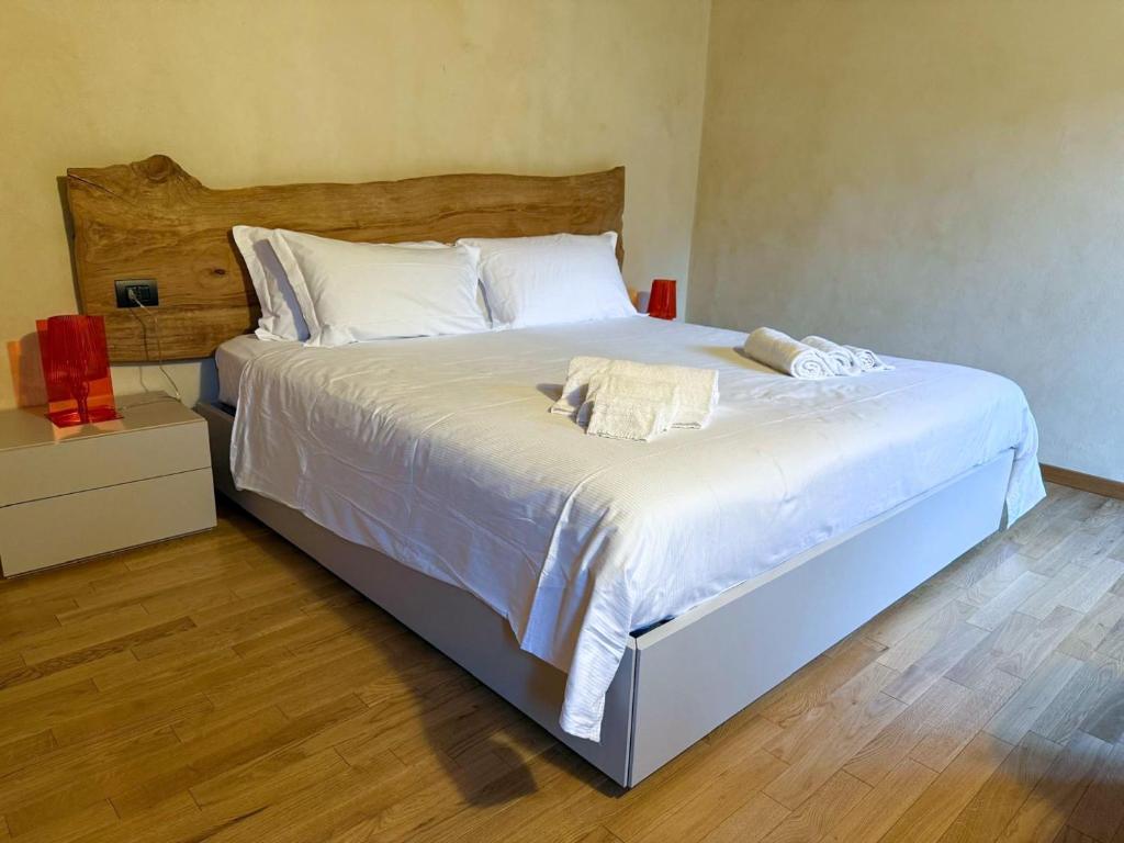 Postel nebo postele na pokoji v ubytování Il Carro Rooms - Monza Centro, Tribunale, Ospedale