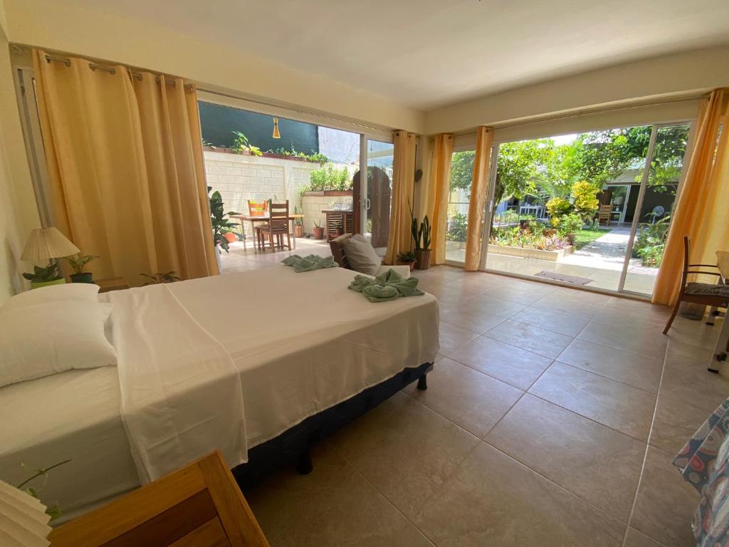 Pura Vida Boutique Apartments - Tweepersoonskamer Met Uitzicht Op De Tuin