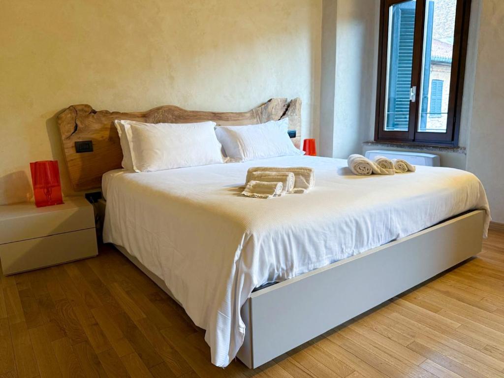 Postel nebo postele na pokoji v ubytování Il Carro Rooms - Monza Centro, Tribunale, Ospedale