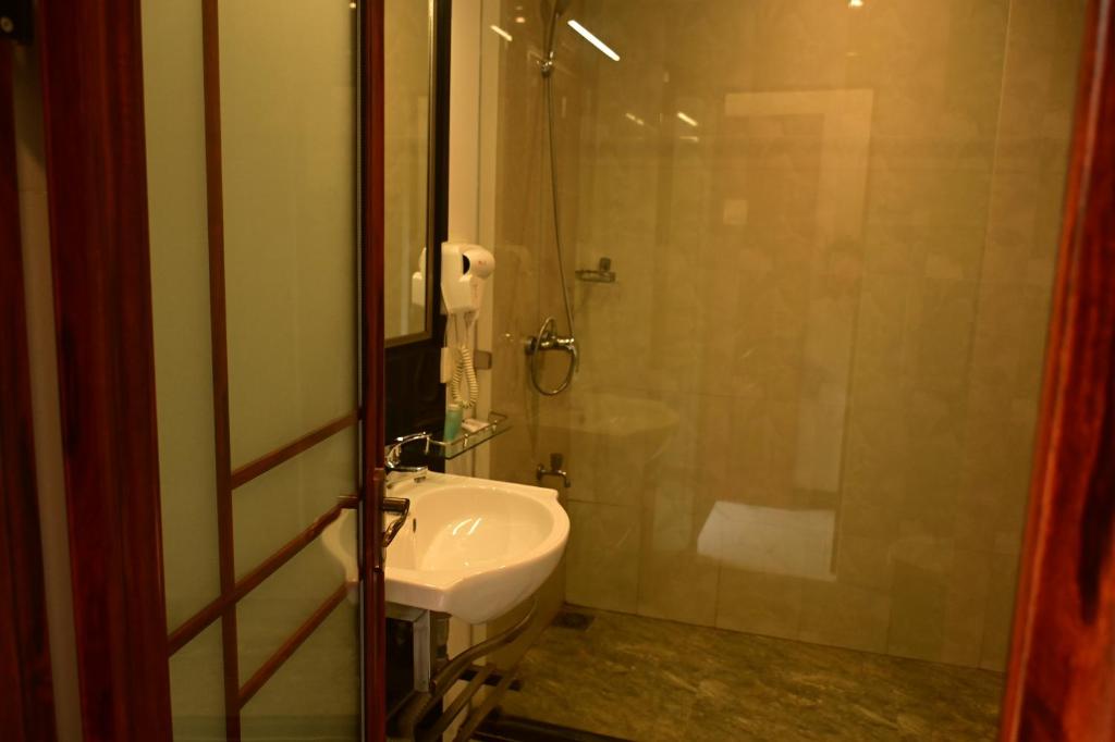 Koupelna v ubytování Agbo Hotel