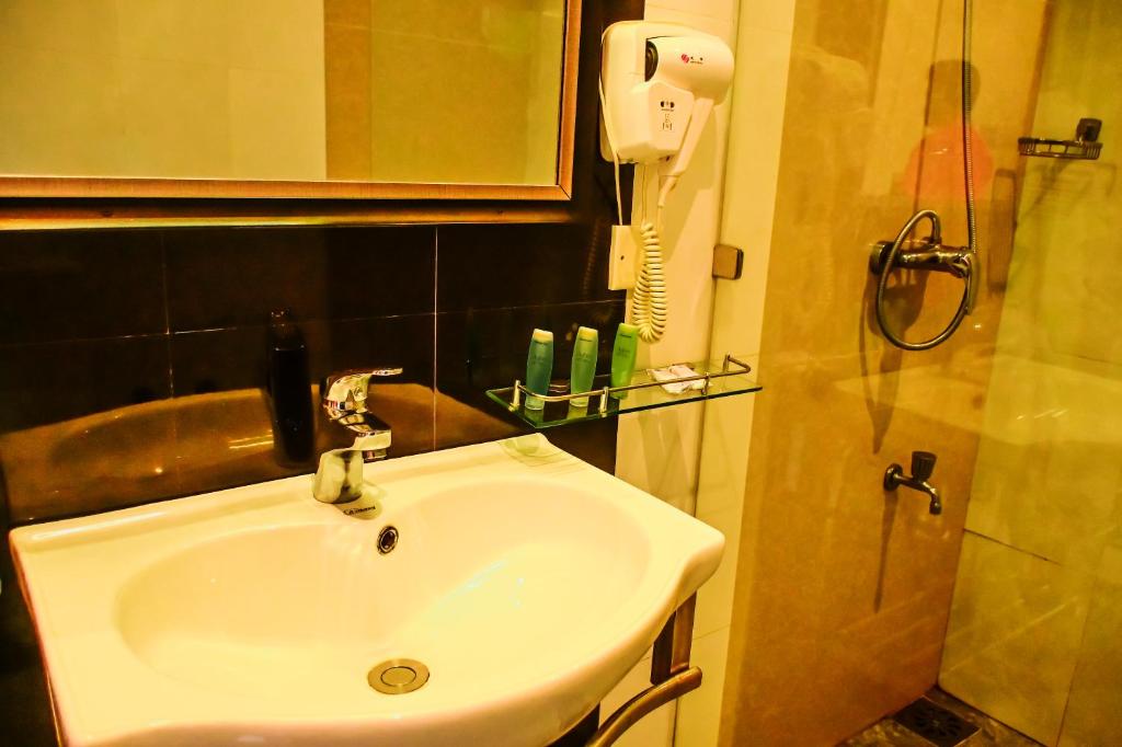 Koupelna v ubytování Agbo Hotel