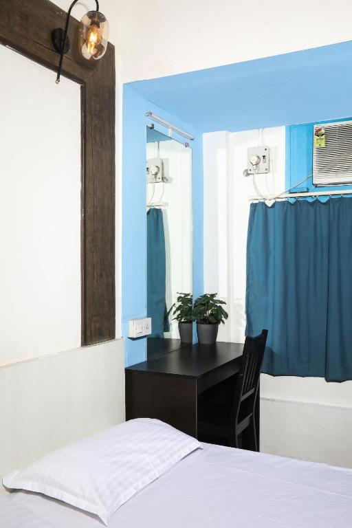Postel nebo postele na pokoji v ubytování Hostel Mantra