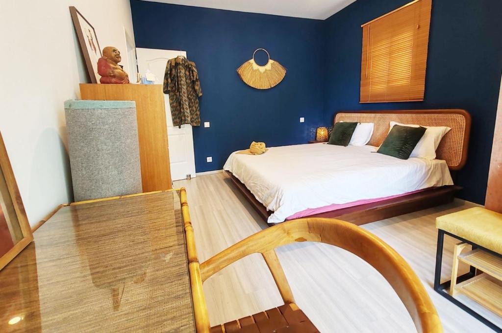 Postel nebo postele na pokoji v ubytování COLIVER - COLIVING A LA RÉUNION