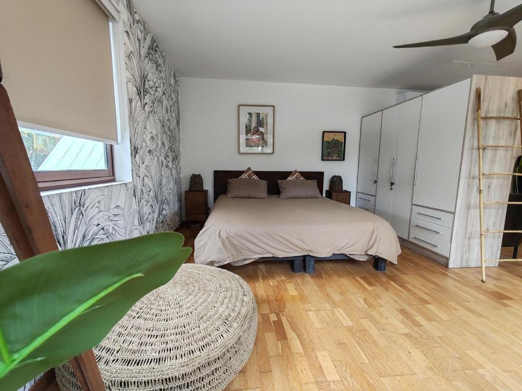 Postel nebo postele na pokoji v ubytování COLIVER - COLIVING A LA RÉUNION