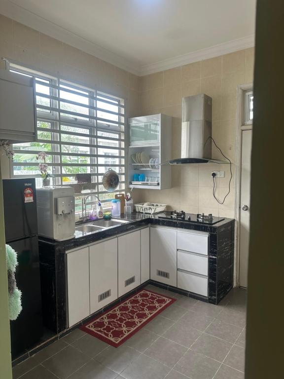 Kuchyň nebo kuchyňský kout v ubytování Ct tiara homestay